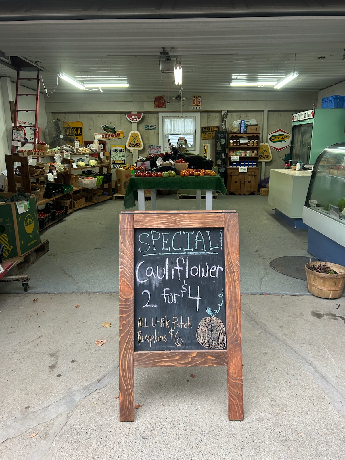 Our new sandwich board sign in front of the market